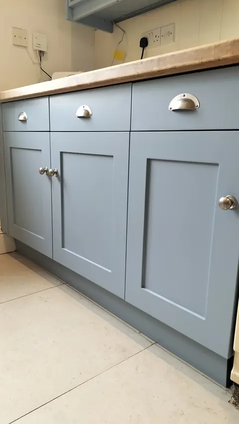 Blue-grey shaker island with cup handles